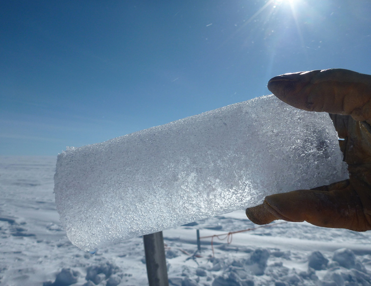 |	Figure 1: Ice core sample.  (Source: climate.nasa.gov/system/news_items/main_images/2616_p1000526-1280px-90.jpg)