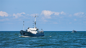 research vessel in ocean water