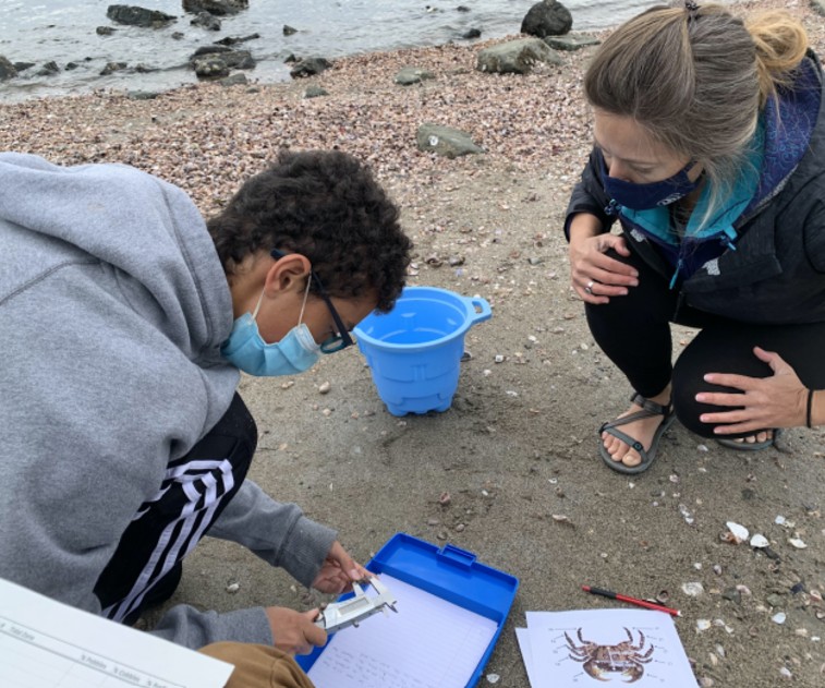 How can we work with our families or other community members to address socio-environmental issues within our community?