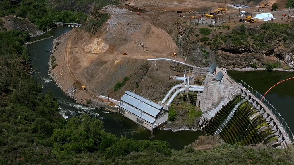 How do we decide if we should remove a dam or repair and maintain it?